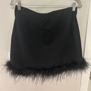 Lush mini skirt with feather